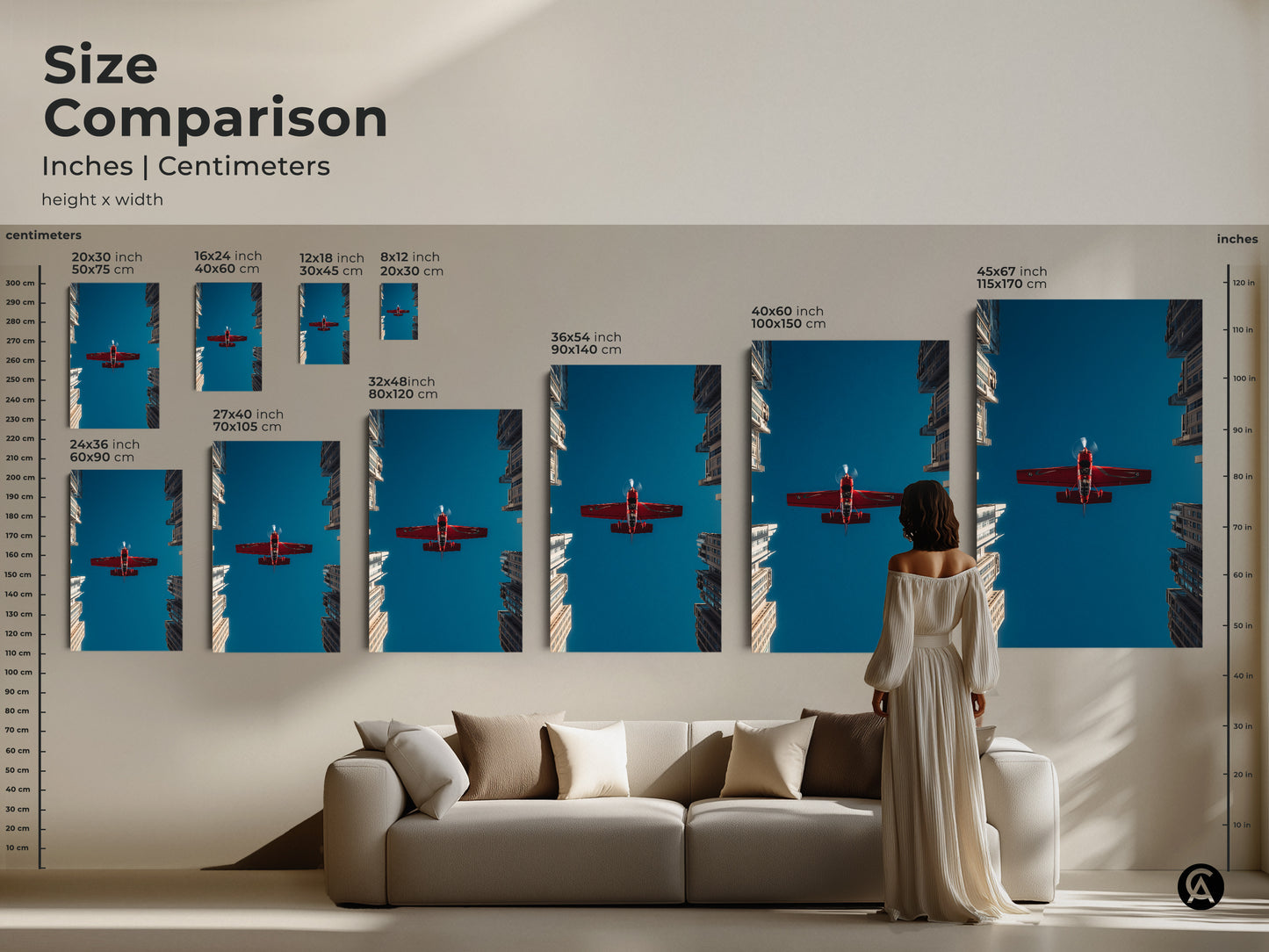 Size comparison of aviation artwork prints. Inches and centimeters are shown. Featuring a crimson red aeroplane soaring above urban skyscrapers against a deep blue sky. Various sizes available for canvas and poster. Find the perfect fit for your space.