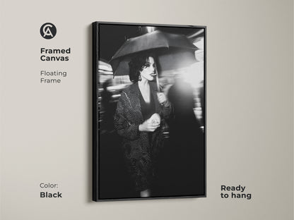 Add sophistication with this framed canvas art. The black floating frame enhances the monochrome woman art. This street photography print arrives ready to hang. It is a chic fashion wall decor piece. Elevate your home with contemporary art. Perfect for urban apartment decor.