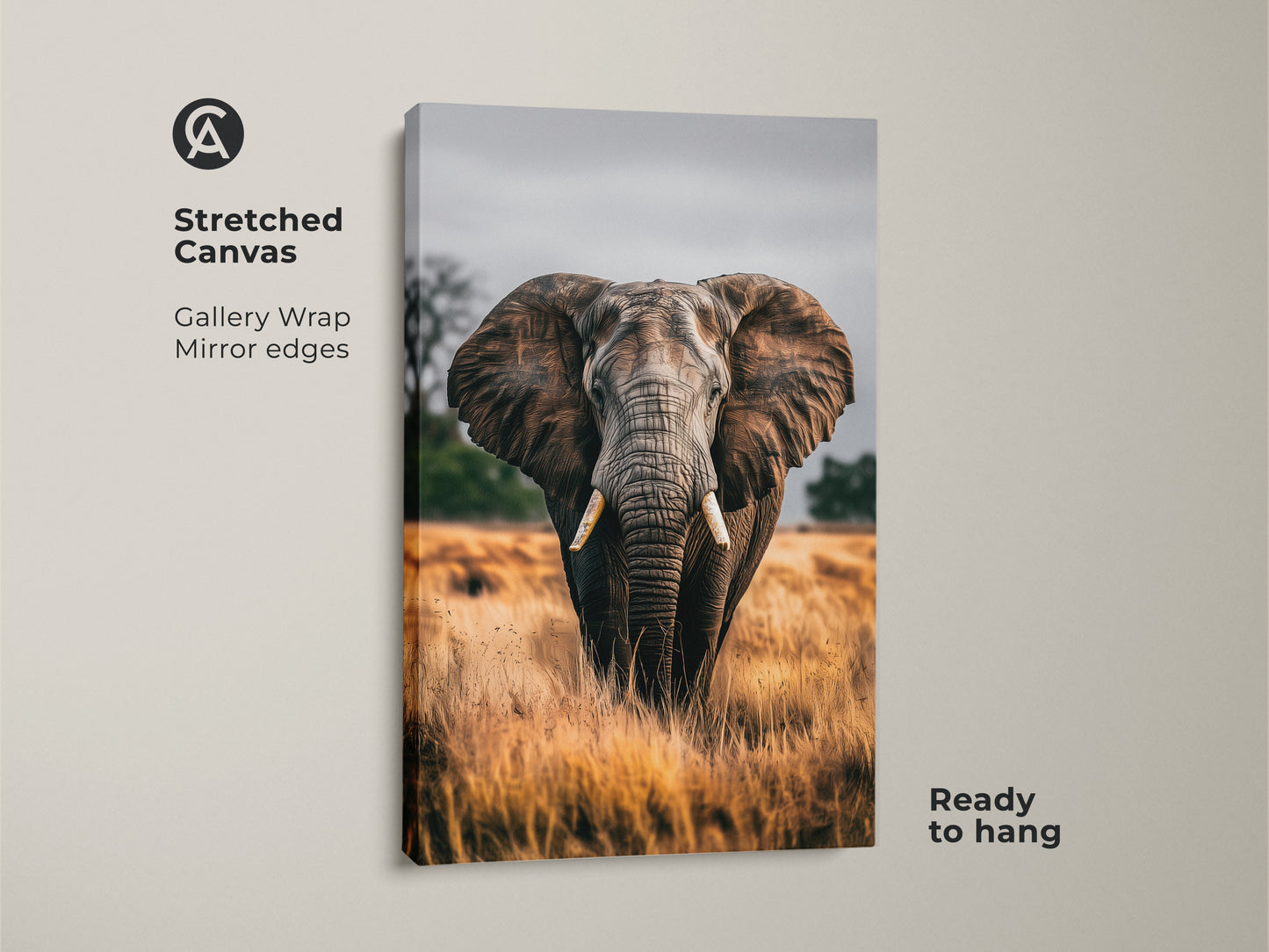Stretched canvas print of a photorealistic elephant. This wildlife art print features a gallery wrap with mirrored edges. The earthy brown and grey tones bring a rustic touch to any room. Ready to hang this animal art print is perfect for bedroom wall decor or as a housewarming gift.