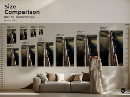 Compare sizes of this modern wall art. See how the realistic aerial train bridge landscape fits in different spaces. This artwork is available in various sizes from small to large. This canvas or poster print will transform your home decor.