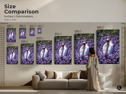 Size comparison of the Botanical Swan artwork in a living room setting. Sizes range from small to large. Options include canvas and poster prints. The art features purple and green flowers with a white swan.