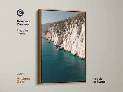 Framed canvas of ocean cliff coastal art in antique gold frame. This piece makes a perfect beach lover housewarming gift with its realistic ocean nature artwork and seaside landscape.