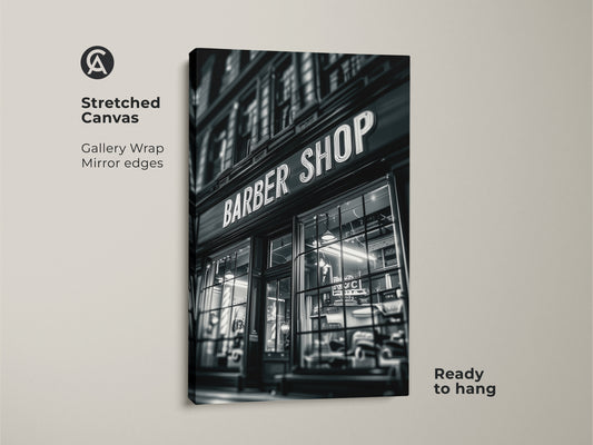 A gallery-wrapped stretched canvas print is displayed. The artwork shows the front of a Barber Shop. Its black and white tones add sophistication. Mirror edges enhance the depth. This piece is ready to hang and admire.
