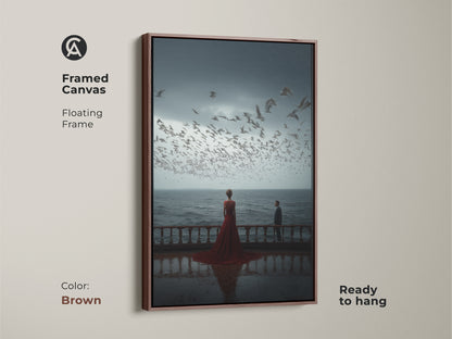 A brown framed canvas displays couple art ready to hang. The floating frame complements the coastal artwork. This romantic anniversary gift shows a couple viewing seagulls. It's ideal for home decor. The surreal cinematic canvas print adds warmth to any living space.