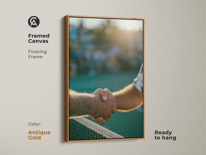 Antique gold framed canvas art showing a handshake over a tennis net. The floating frame adds a vintage touch. This ready-to-hang artwork brings sophistication to any space. Order yours today.