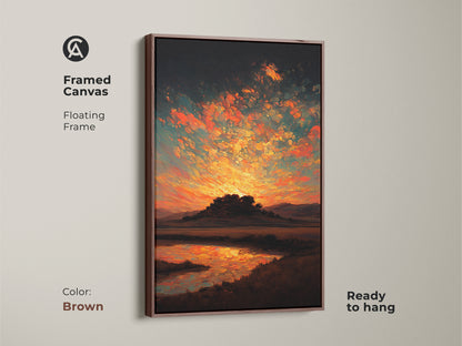 A framed canvas featuring an impressionistic sunset landscape. The floating frame is brown. This wall decor is ready to hang. The art print uses orange yellow and teal.