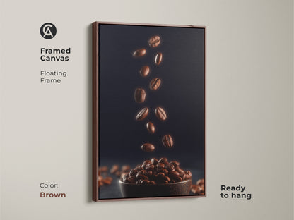 Framed canvas with a floating brown frame featuring falling coffee beans. This modern kitchen artwork has rich brown coffee beans against a deep navy backdrop. Ready to hang this is the perfect gift for coffee lovers or a sophisticated cafe interior.