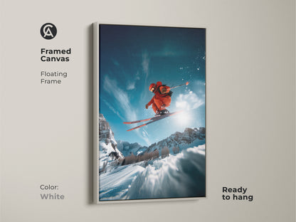 Framed canvas art showing a skier in action. The floating frame is white and offers a clean modern look. This ready-to-hang piece brings energy to any space. Ideal for sports enthusiasts and art collectors alike. The high-quality print is stunning.