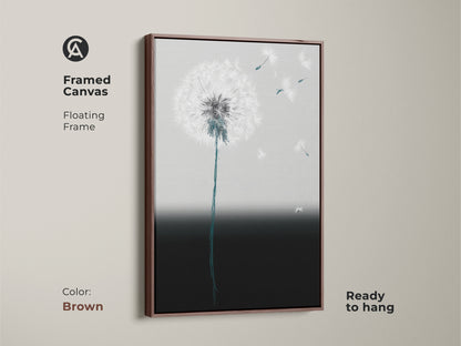 Framed minimalist dandelion art print. Brown floating frame enhances the abstract botanical artwork. Teal and gray seeds float gently. This contemporary canvas is ready to hang. It adds modern elegance to any room. The soft gradient art decor complements any space.