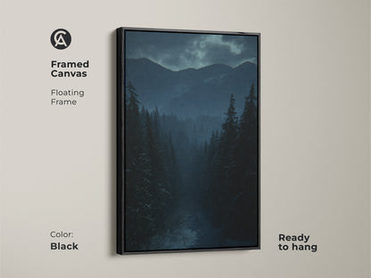 Framed canvas of a deep blue and teal winter forest. Black floating frame enhances the moody mountain wall art. The rustic nature scene wall hanging is ready to hang. Snowy mountain canvas print.