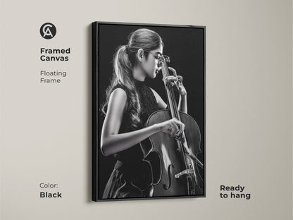 Framed canvas features a cellist. The artwork showcases a floating frame in black. Ready to hang this contemporary piece enhances any room. It is a perfect gift for music enthusiasts and lovers of classical art.