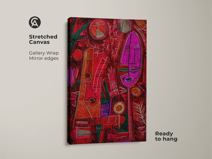 Stretched canvas shows an abstract tribal wall art. The crimson red abstract print includes pink and emerald green colors. This mask face artwork with geometric patterns is ready to hang in an eclectic home.
