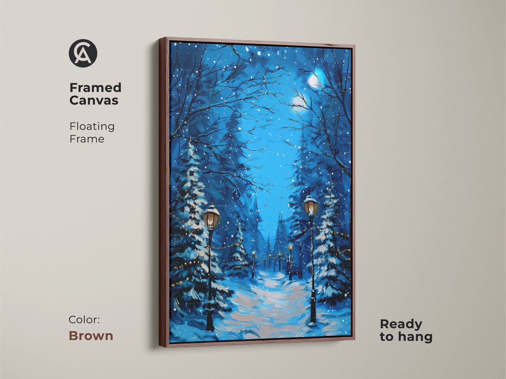 Framed canvas with a brown floating frame showcasing winter landscape art. The snowy path is illuminated by street lamps. This rustic Christmas decor piece is ready to hang. It is perfect as a deep blue teal print for winter lovers.