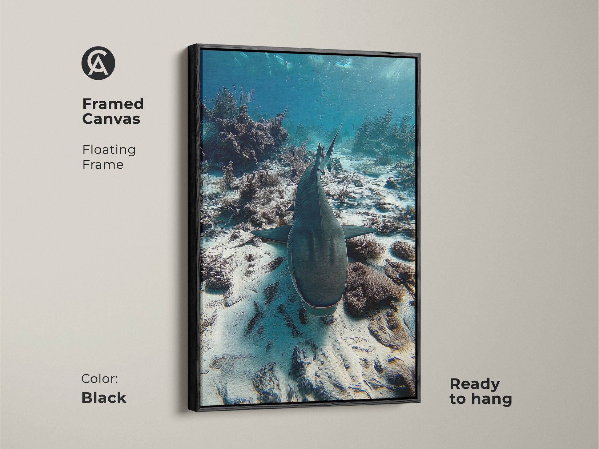 Framed canvas with floating frame showcasing underwater shark artwork. This photorealistic ocean print captures a shark swimming above a coral reef. The black frame enhances the deep blue and teal tones of the wildlife art. Ready to hang. Perfect for adding a touch of coastal charm to any space.