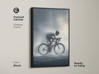 Framed canvas featuring a road cyclist in motion with a floating frame. The black frame enhances the charcoal silver artwork. Ready to hang this modern sports canvas is perfect for office wall art or athletic home decor. A great gift for cyclists or triathlon enthusiasts.