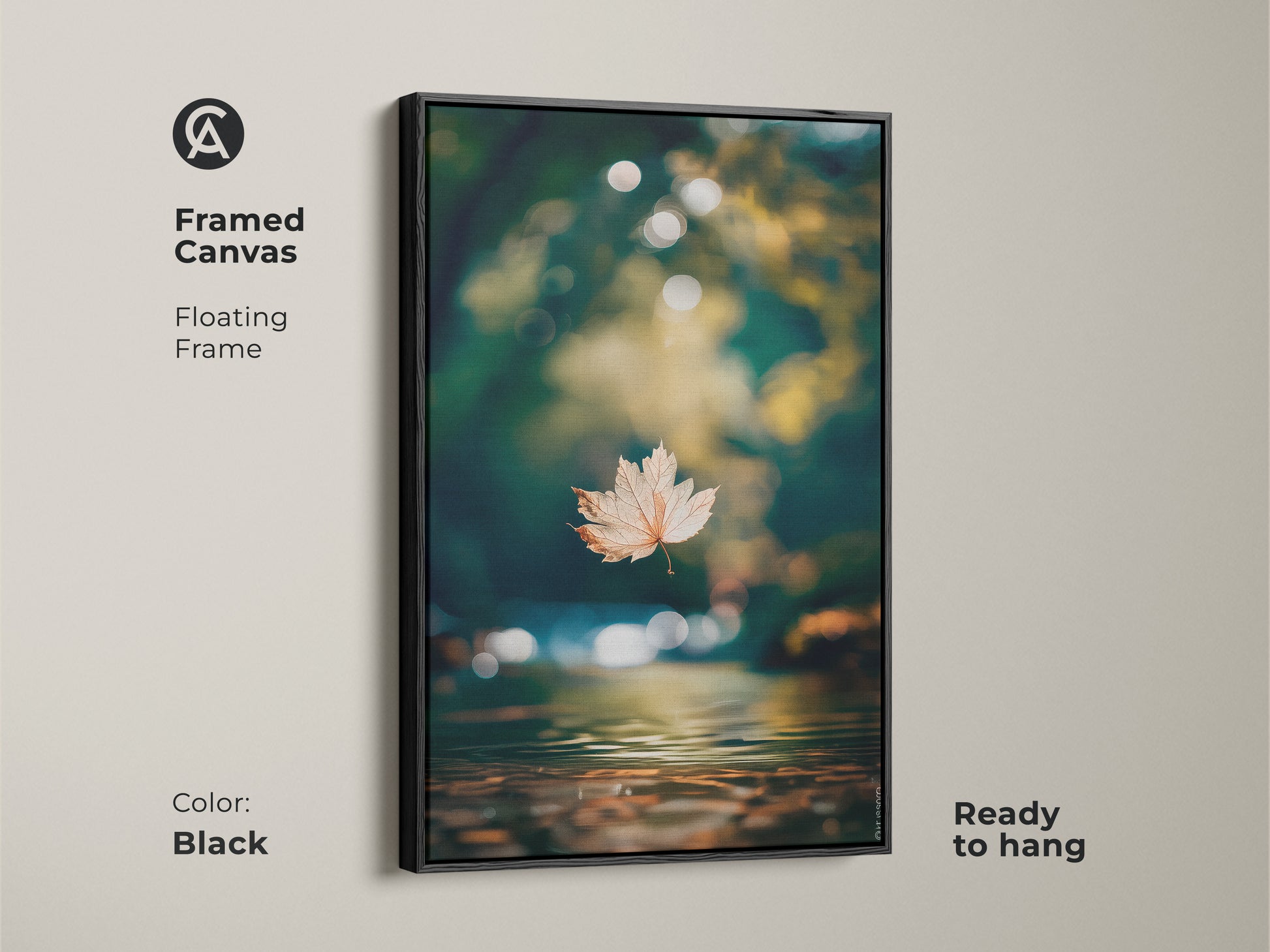 Framed canvas art with a floating frame. The black frame complements the leaf artwork. It is ready to hang in any space. The reflection on the water adds depth. A sophisticated wall decor choice.