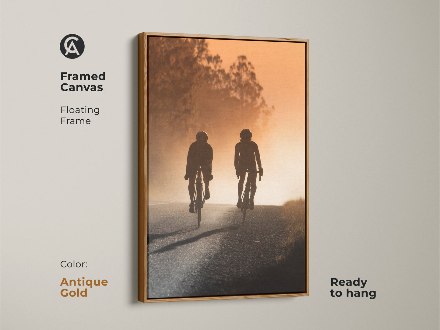 Framed canvas art featuring a cycling couple silhouette. The modern road artwork has a floating antique gold frame and is ready to hang. Perfect modern entryway home decor or a unique gift for cyclists. Captures a sense of journey and shared experience.