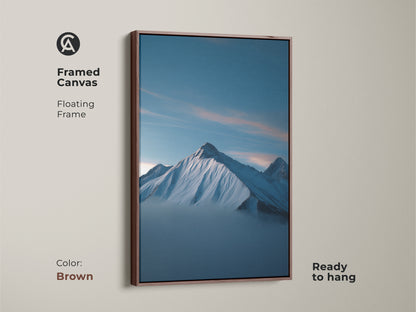 Framed canvas in brown featuring a Snowy Mountain Landscape. The deep blue landscape print is a ready to hang minimalist nature artwork. Perfect modern decor for an office or bedroom.
