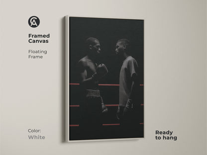 Framed canvas featuring minimalist boxer artwork in a white floating frame. The black and white art shows boxers in a ring. It's ready to hang perfect for adding motivation to any space. Ideal industrial style for a sports enthusiast or boxing fan. Elevate your office workspace art.