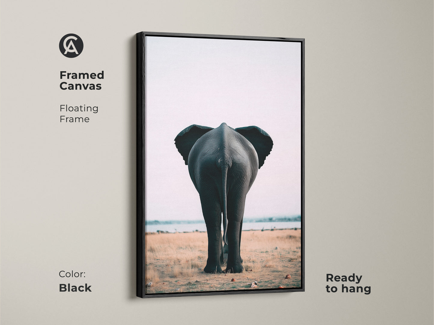 Black framed canvas featuring an elephant butt print. This wildlife artwork is ready to hang. The floating frame enhances the photorealistic animal art. A contemporary addition to any room. Showcasing a minimalist savanna aesthetic. Perfect for adding a touch of nature to your home decor. A unique elephant rear view.