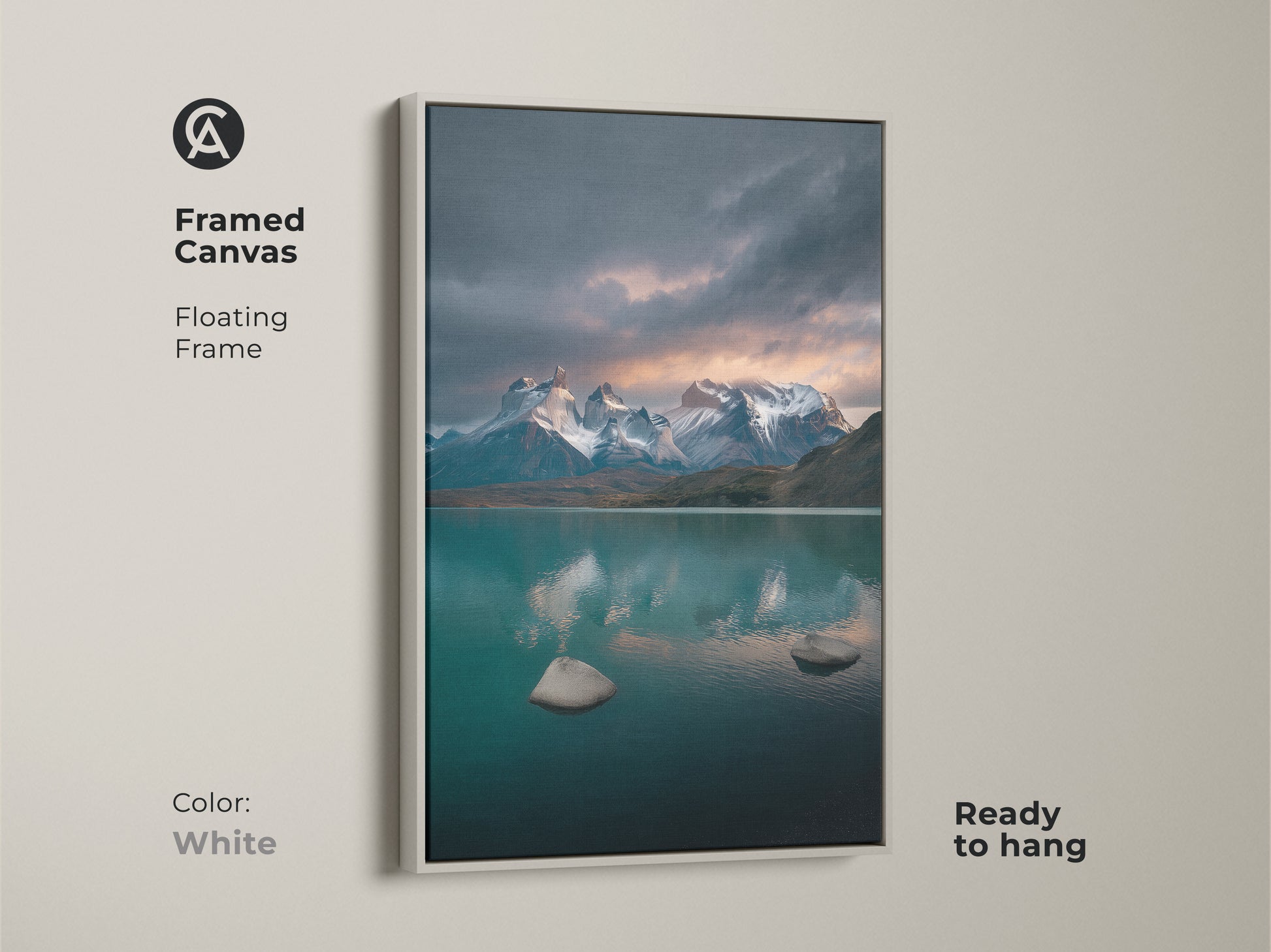 Framed canvas with a floating white frame showcasing a teal lake and snow mountain scene. Ready to hang this scenic artwork enhances your living space. This contemporary nature decor brings a calming touch. Ideal for outdoor enthusiasts. The deep blue gray artwork adds elegance to bedroom walls. Perfect gift.