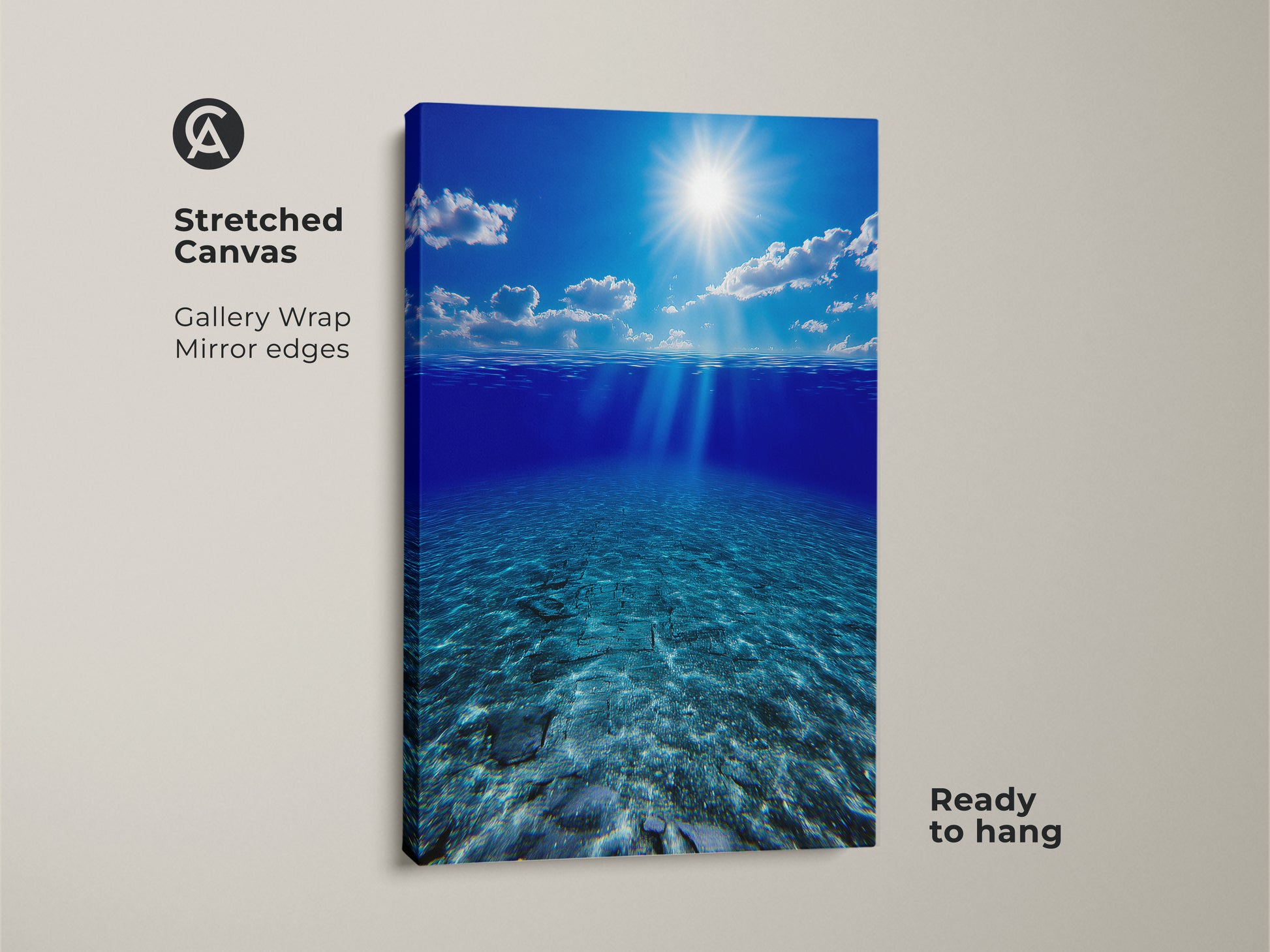 Stretched canvas print showcasing underwater sunbeams in a deep blue ocean. This gallery-wrapped artwork has mirror edges and is ready to hang. Ideal coastal beach house decor brings tranquil ocean floor views to your living room or bedroom. It makes a thoughtful housewarming gift.