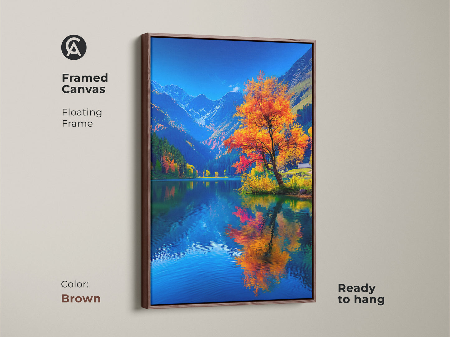 Brown framed canvas displaying an autumn scene with a lake and mountains. The floating frame complements the artwork. This ready to hang piece adds warmth to your decor. A beautiful framed landscape art.