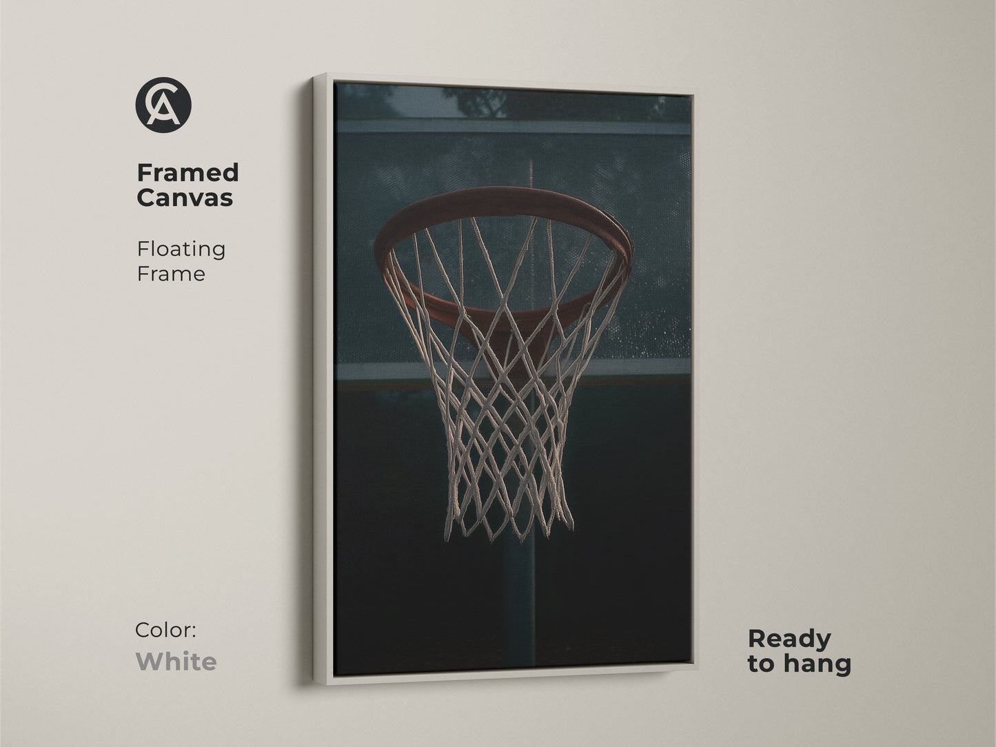 Framed canvas of a basketball hoop with a floating frame in white. This minimalist sports print is ready to hang in any space. This game room artwork adds an athletic touch to your home decor. The urban sports wall art is perfect for a man cave.