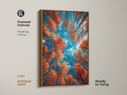Framed canvas art featuring a vibrant forest with orange foliage and a blue sky. The antique gold floating frame adds a touch of sophistication. This ready-to-hang piece brings nature indoors. Shop now for unique framed artwork. Enhance your home's decor today.