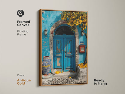Framed Canvas features a Mediterranean blue door and lemon tree. The floating frame is antique gold. This boho coastal art is a travel lovers gift. Ready to hang this azure and yellow artwork adds a touch of Mediterranean charm to your home.