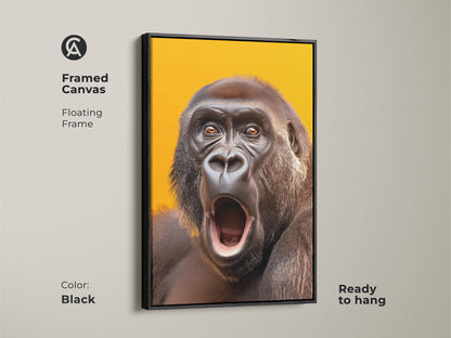 Framed canvas with a realistic gorilla. This primate art features a floating black frame. The wildlife wall art is ready to hang. The yellow orange canvas is modern.