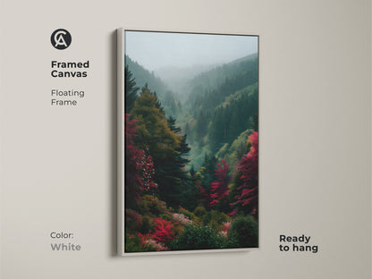 White framed canvas showcasing misty mountain artwork. This floating frame artwork is ready to hang. Refresh your decor with this landscape art print. Explore fine art prints now.