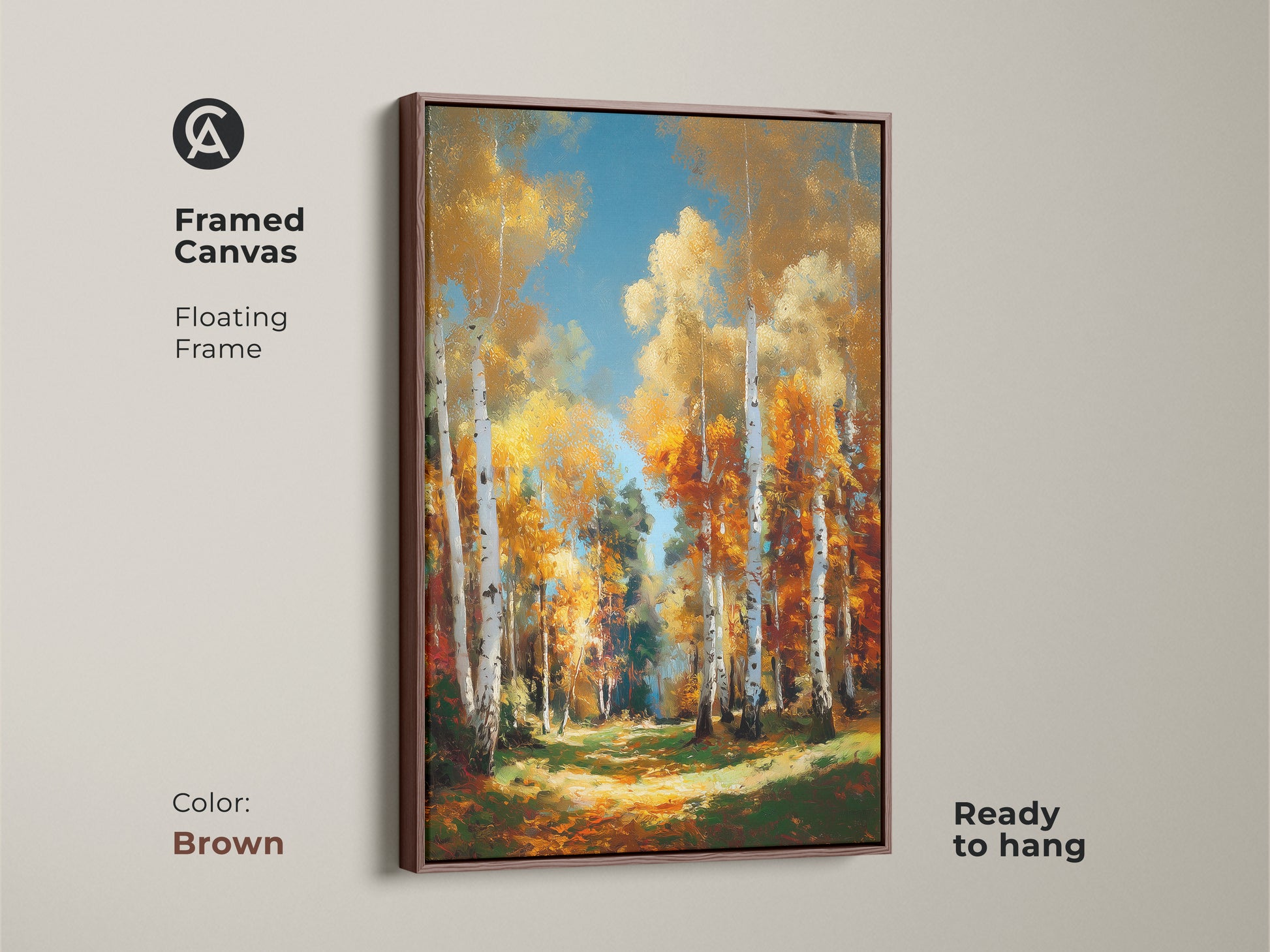 Brown framed canvas artwork of a birch tree forest in autumn. The floating frame gives a modern look. This wall art is ready to hang. It is a beautiful addition to any room or space