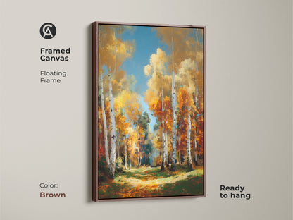 Brown framed canvas artwork of a birch tree forest in autumn. The floating frame gives a modern look. This wall art is ready to hang. It is a beautiful addition to any room or space