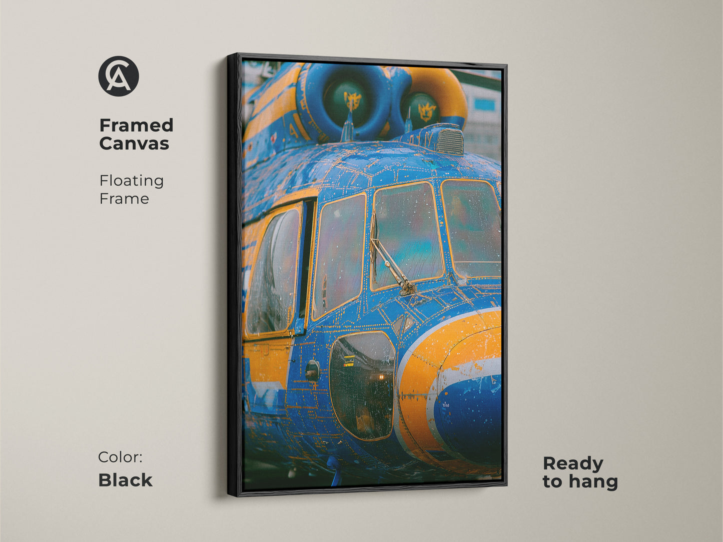 Framed canvas art featuring a blue and yellow helicopter. The floating frame is black. This unique piece of art is ready to hang. The helicopter artwork is printed on a framed canvas.