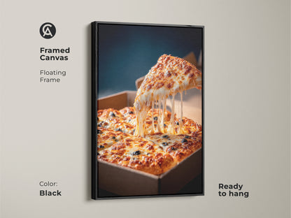 Black framed canvas pizza art. The artwork has a floating frame. A slice of pizza is lifted with melted cheese. A square pizza in a cardboard box sits below. This pizza artwork is ready to hang.