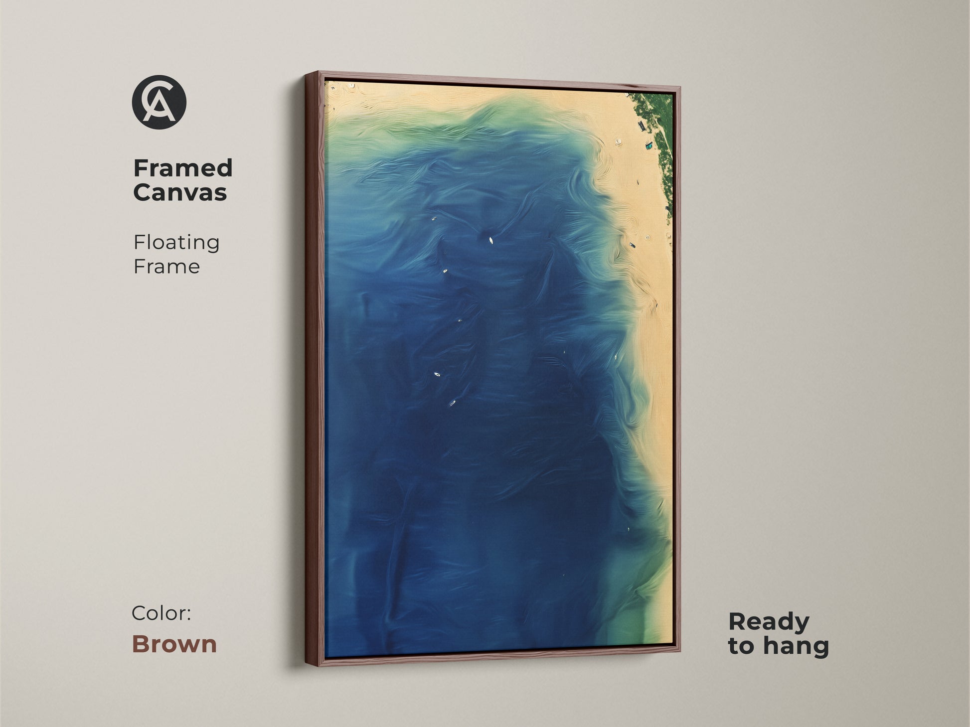 Framed canvas of abstract coastal artwork. The artwork features a brown floating frame. Ready to hang ocean themed home decor. Deep blue wave artwork with aqua green accents. A beautiful piece of modern coastal art.