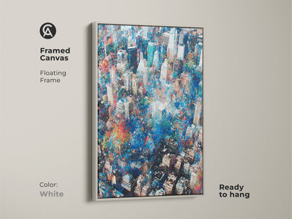 Framed canvas artwork showcasing an aerial cityscape. The floating frame is white and clean. The artwork is ready to hang and enjoy. The white frame provides a modern touch. The art piece is very unique and elegant.