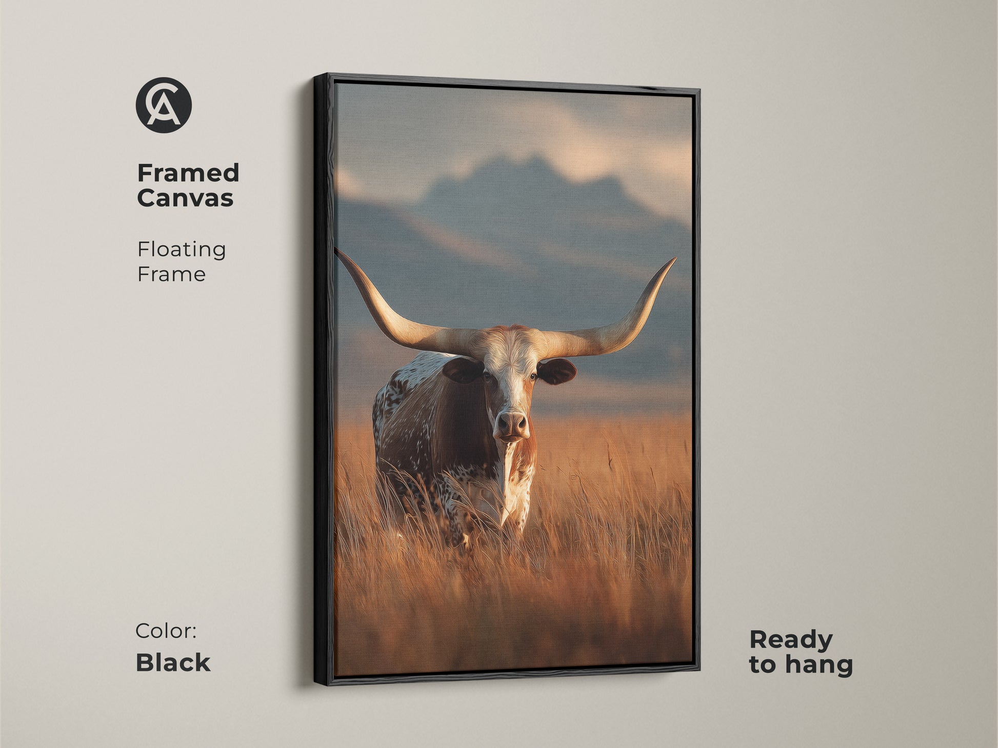 Black framed canvas of longhorn cattle. This floating frame is ready to hang. The rustic western landscape uses warm earth tones. This farmhouse wall decor captures the beauty of wildlife. This animal art print is perfect for a cowboy ranch style home.