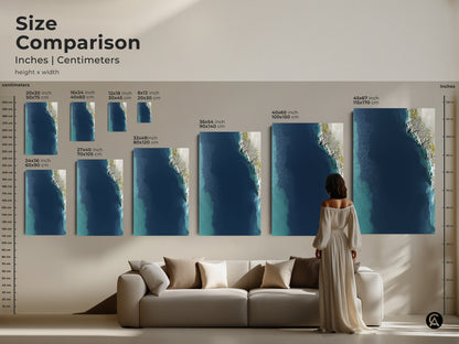 Size Comparison for Coastal Abstract Wall Art. See how the artwork looks in various sizes from 20x30 cm to 45x67 inches. Visualize the impact of this deep blue shoreline canvas in your living room. Perfect for any space.