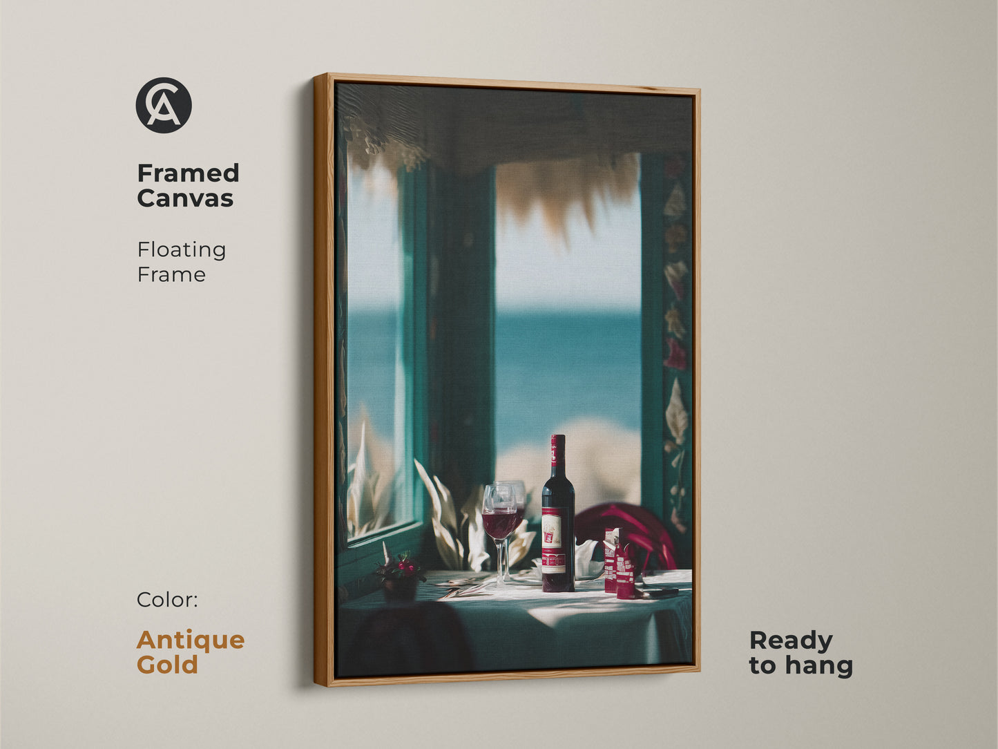 Framed canvas art in antique gold with a coastal wine scene. This floating frame is ready to hang. It's ideal for dining room or restaurant wall decor. This contemporary print includes a wine bottle and glass. The seaside setting adds relaxed elegance to any space.