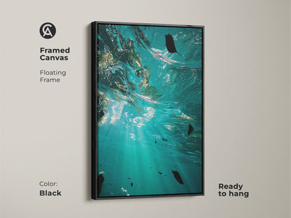 Framed canvas with a floating black frame displaying underwater ocean artwork. The teal aqua scene brings coastal charm to any room. Ready to hang marine life artwork that captures naturalistic beauty.
