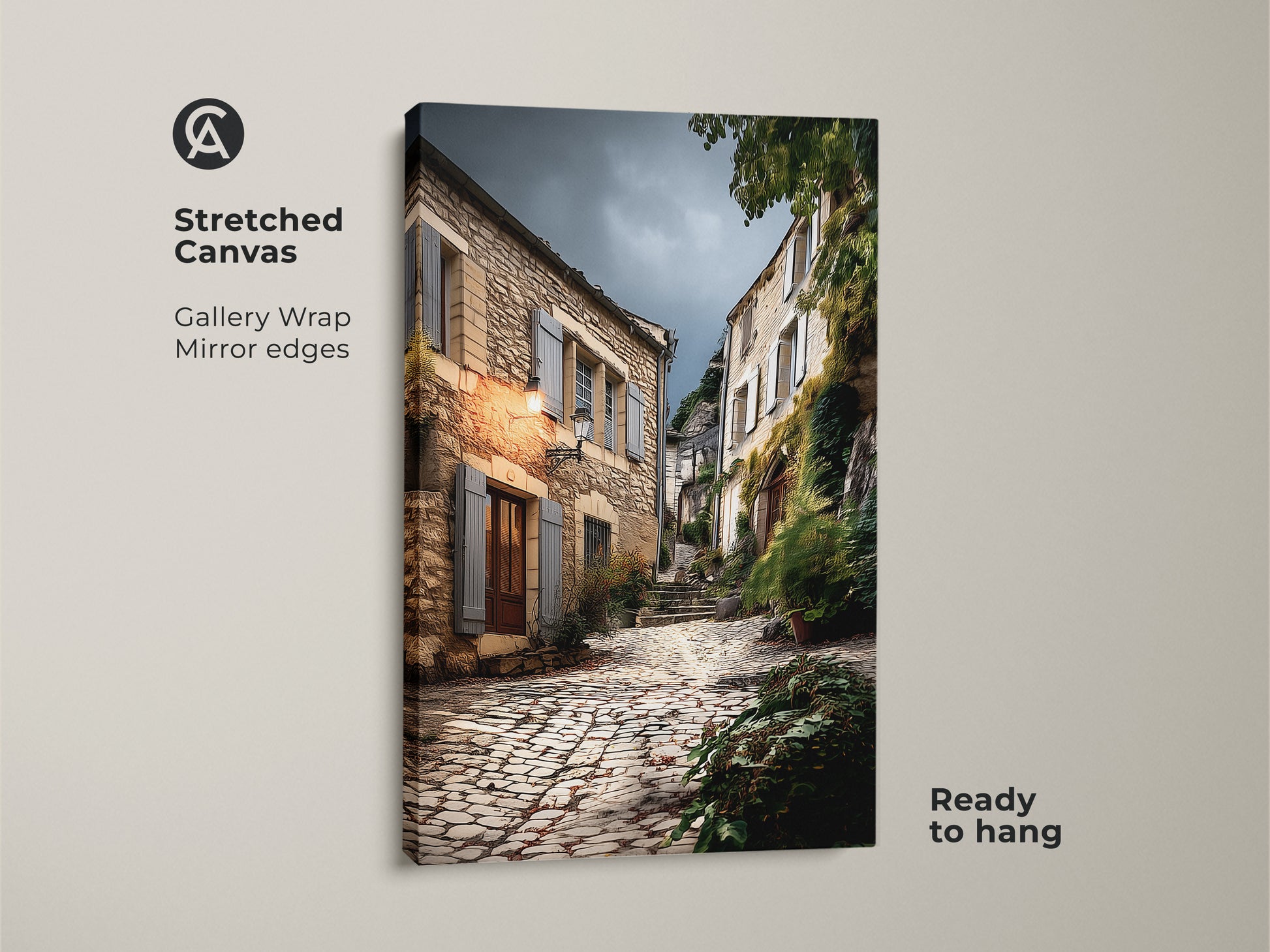 Stretched canvas print of a European village street. The gallery wrap with mirror edges enhances the rustic landscape painting. Beige and brown tones create a cozy atmosphere. Ready to hang this cobblestone street art brings old-world charm to your home. Ideal travel enthusiast gift idea.