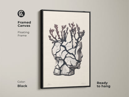 Black framed canvas featuring surreal head sculpture art. The conceptual figurative artwork includes a branch motif. Perfect gothic figurative print for an eclectic beige and black wall. Ready to hang floating framed canvas adds contemporary conceptual artwork to a living room or office.