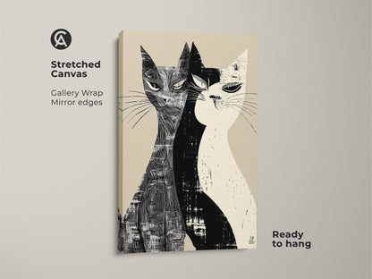 Stretched canvas print of a Mid-Century Modern cat art. This gallery-wrapped artwork features two cats in a black and white linocut style. The minimalist pet lover gift is ready to hang bringing character and style to your walls.