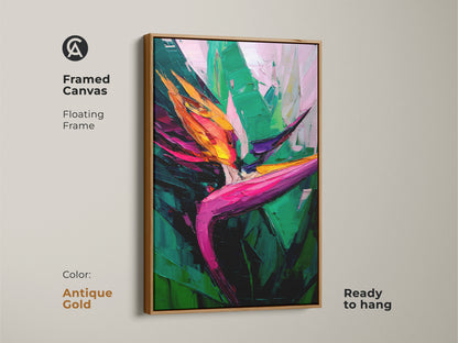 Framed canvas featuring a Bird of Paradise. This tropical leaves artwork has an antique gold floating frame. This boho botanical art print brings vibrant color to any room. Ready to hang.