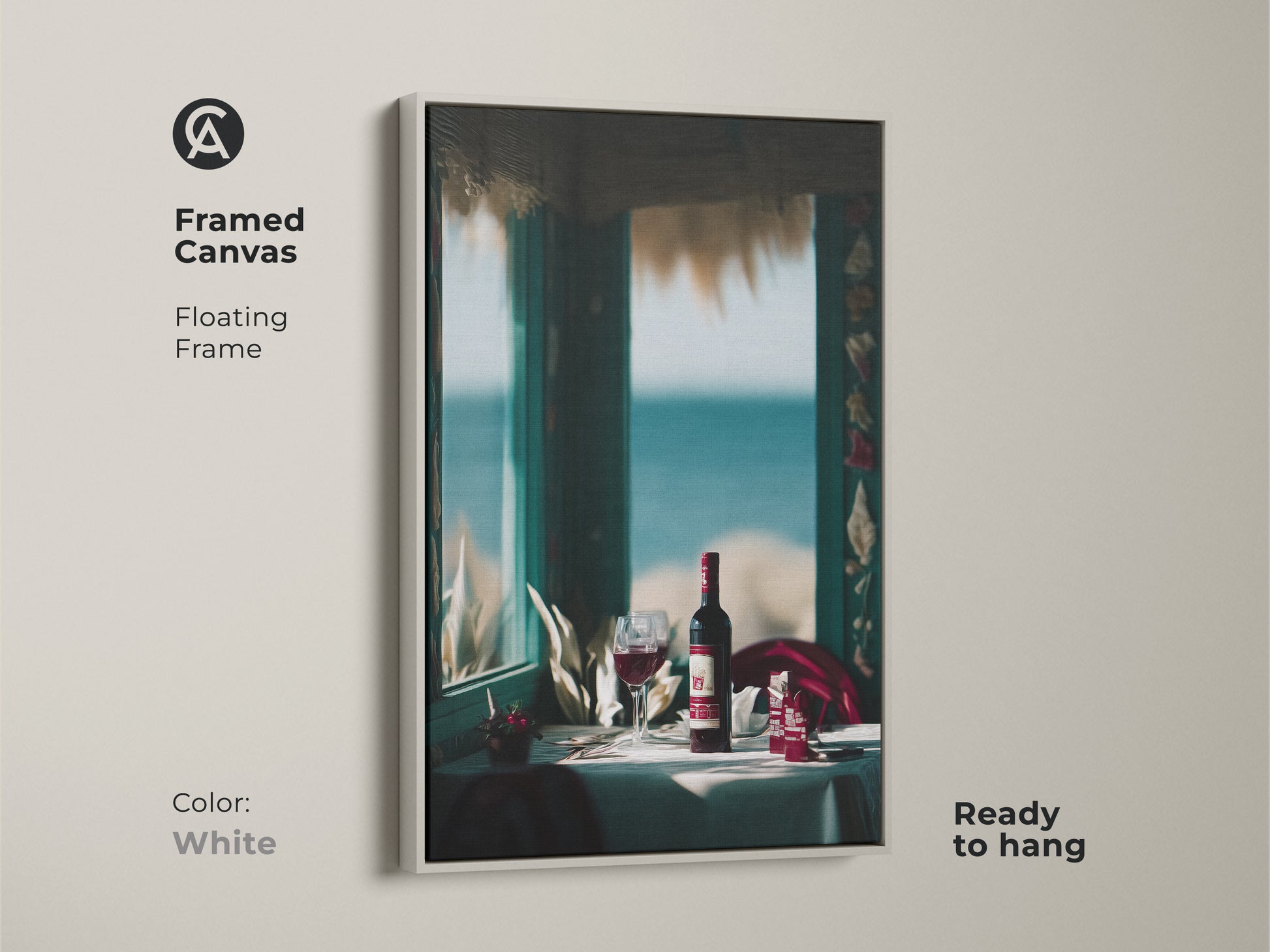 Framed canvas art in white featuring a coastal wine theme. The floating frame is ready to hang. It's ideal for dining room or restaurant decor. This contemporary print features a wine bottle and glass. The seaside setting adds a touch of relaxed elegance.