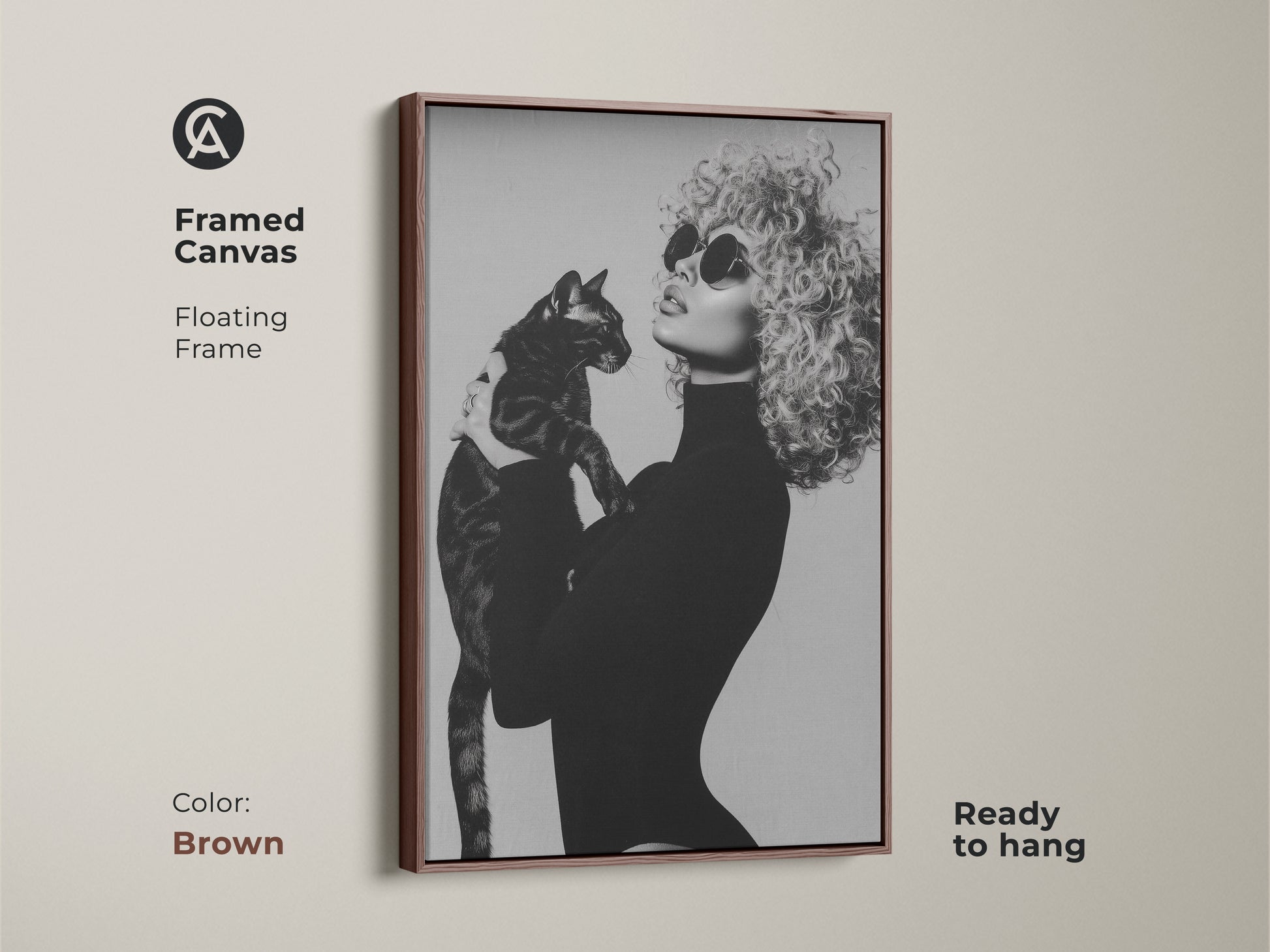 Framed canvas in a brown floating frame featuring a monochrome portrait of a woman with a cat. Black and white glamour fashion art adds a contemporary touch to any home. This ready-to-hang artwork is a unique and stylish gift for cat moms enhancing any room's decor.