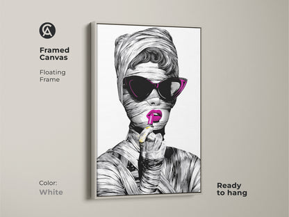 Framed Canvas print of a surrealist makeup art. The white floating frame enhances the black and white art print. This fashionable woman artwork is a modern eclectic decor piece. It's an artistic woman portrait ready to hang.
