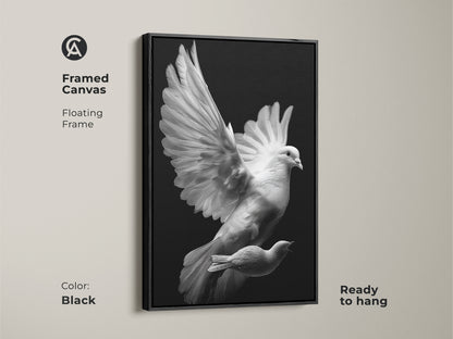 Ready to hang framed canvas. Floating frame displays a monochrome dove art print. This elegant dove artwork is black. This minimalist artwork is ideal as peaceful decor.